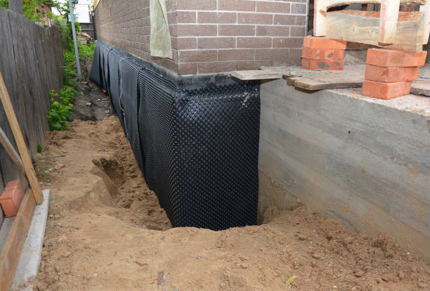 Happy homeowners after waterproofing job in Christiansburg